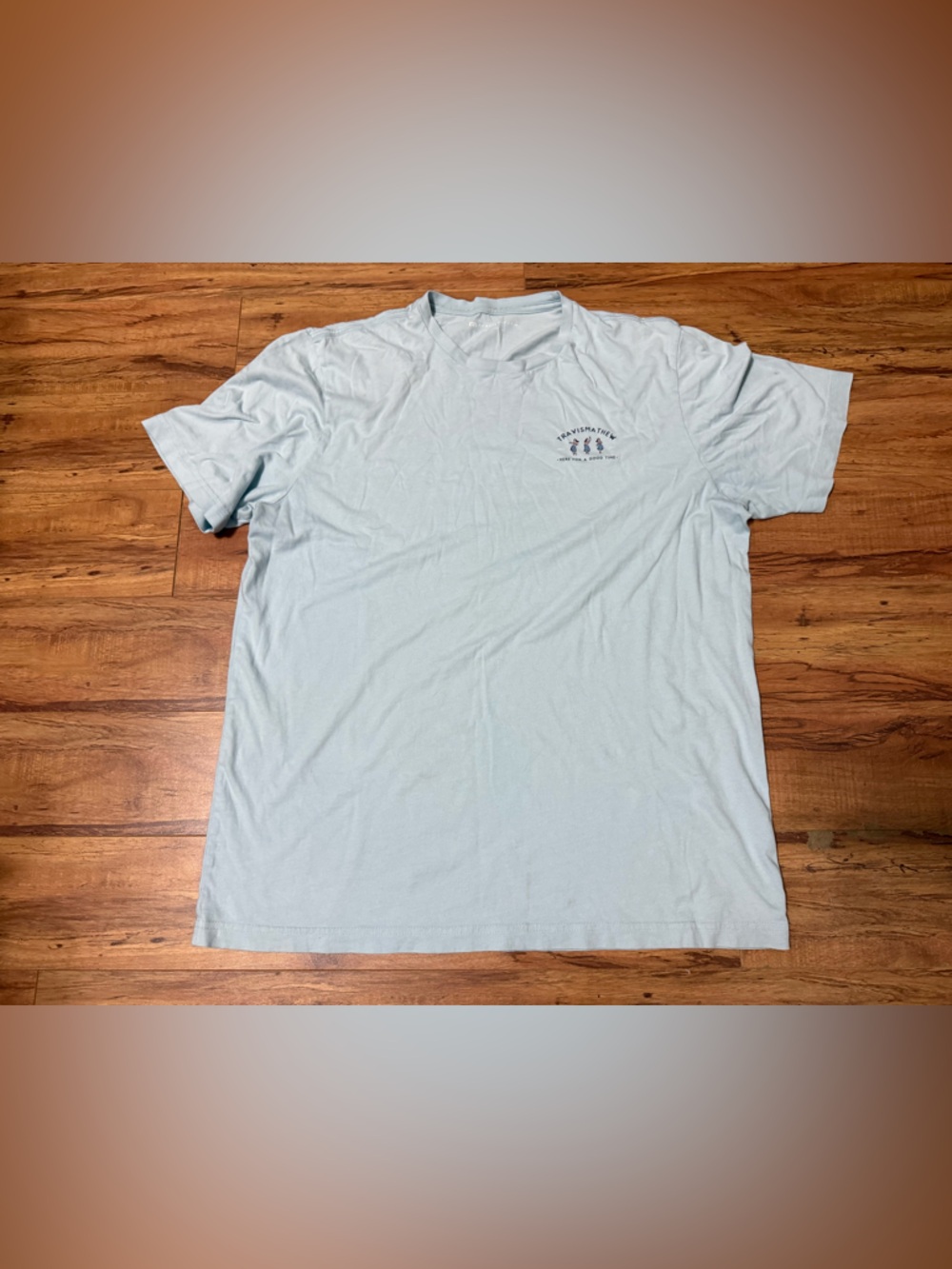 Travis Matthew light blue shirt